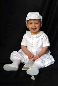 This little man is wearing our Gabriel romper